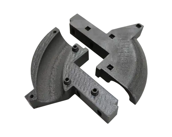 A 3d printed part split in two showing a hinge with hollow curved cylander