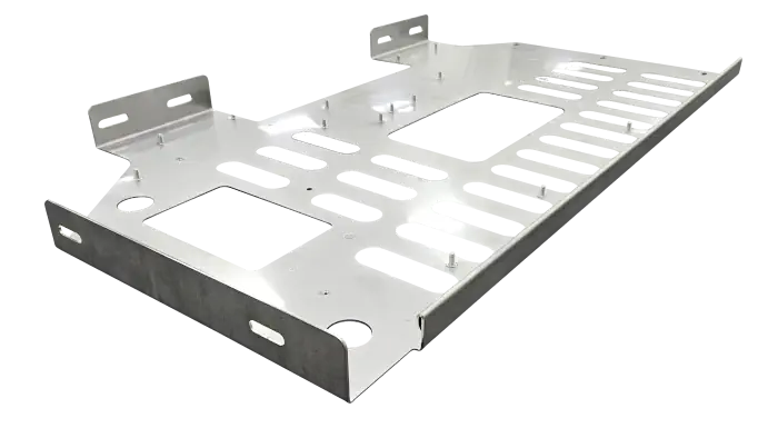 A large metal sheet with cuts and assembly screw sockets