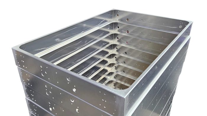 A stack of metal frames lined up like a box