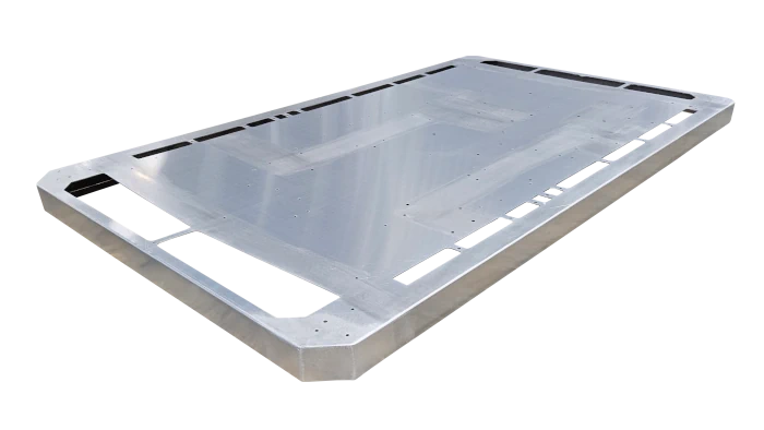 A long sheet of metal with four sides and holes on the top